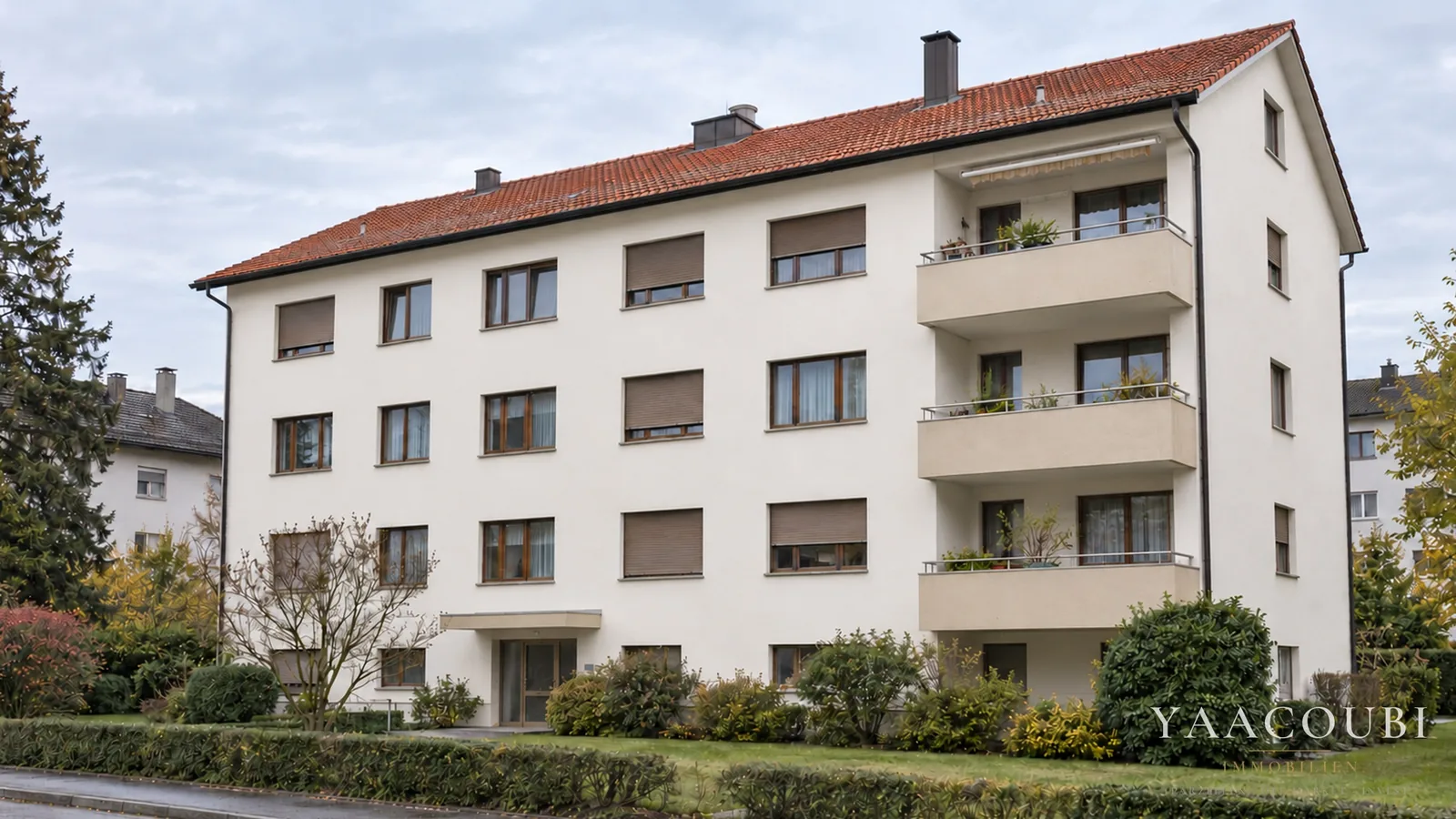 Mehrfamilienhaus mit erneuerter Fassade, Nach der Erneuerung